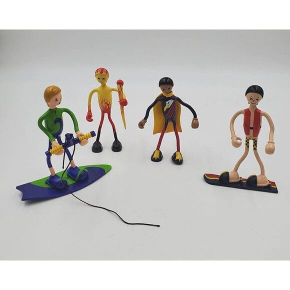 Kid Galaxy Bendos Action Figures Lot Of 4 Bendable People Super Hero Surfer Skin